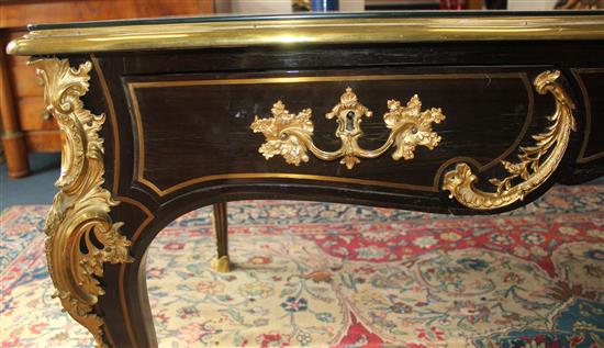 An early Louis XV brass inlaid ebony veneered bureau plat, W.6ft 6in. H.2ft 7.5in.